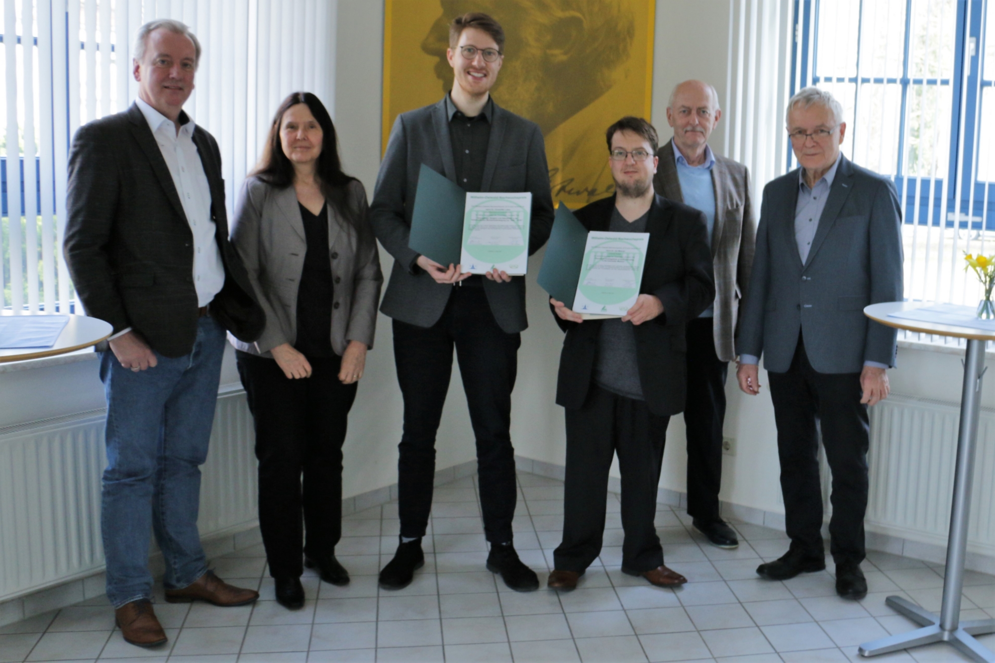 Jan Meisner and Christoffer Leber receiving their price.